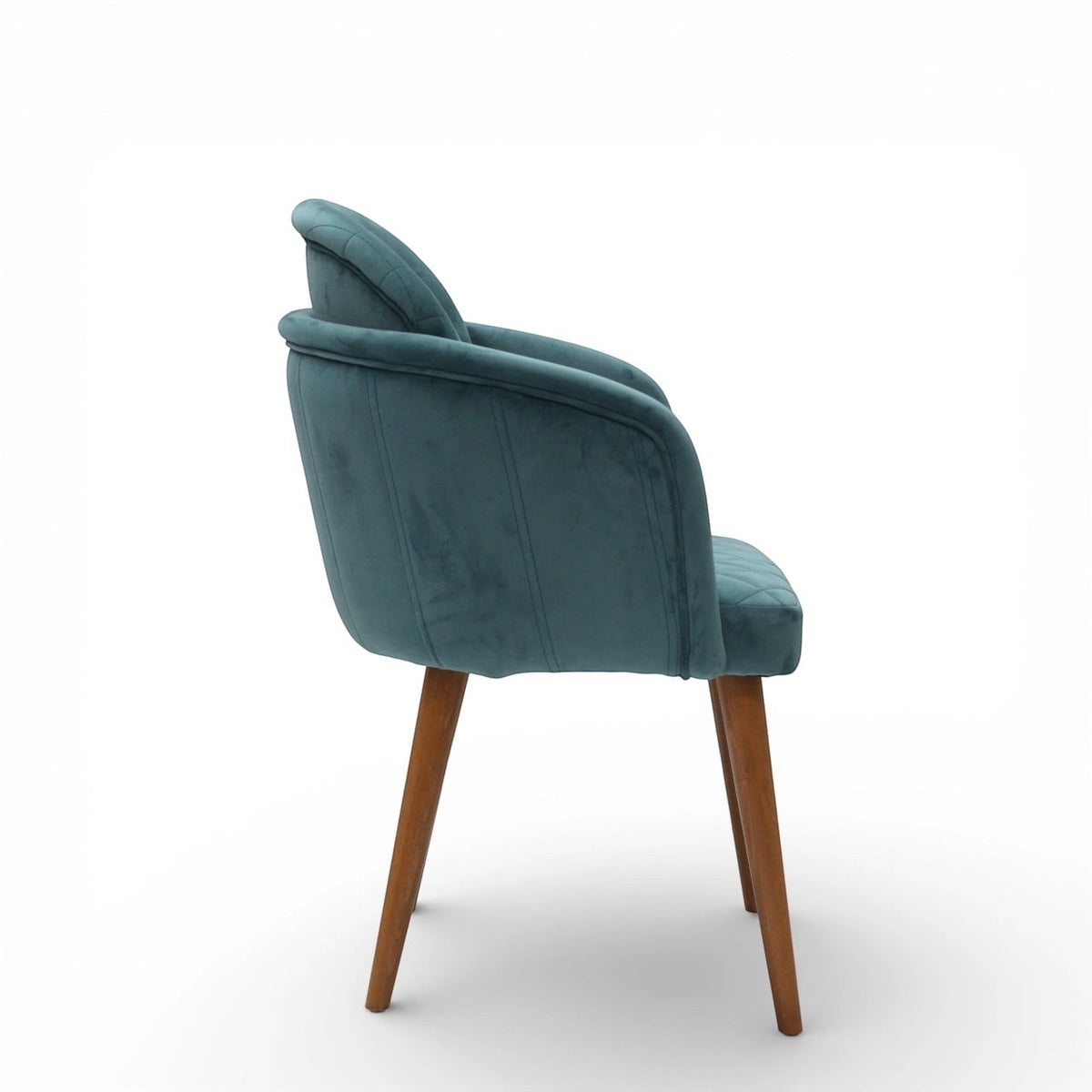 Side rear view of the Vaya Home Silver dining chair featuring blue upholstery, rounded back, and tapered wood legs.