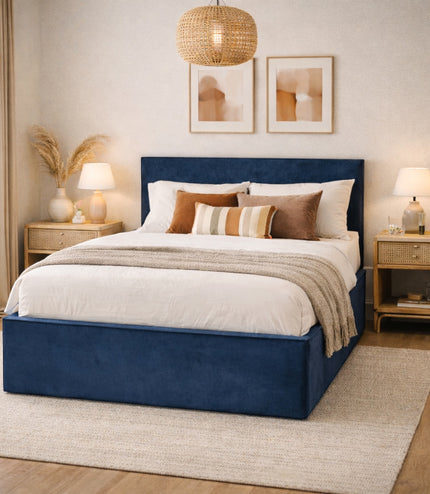 Vaya Home Soho upholstered bed in blue fabric, styled in a modern bedroom.
