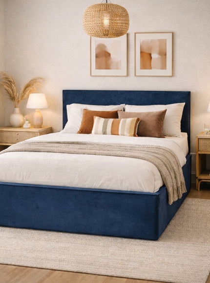 Vaya Home Soho upholstered bed in blue fabric, styled in a modern bedroom.