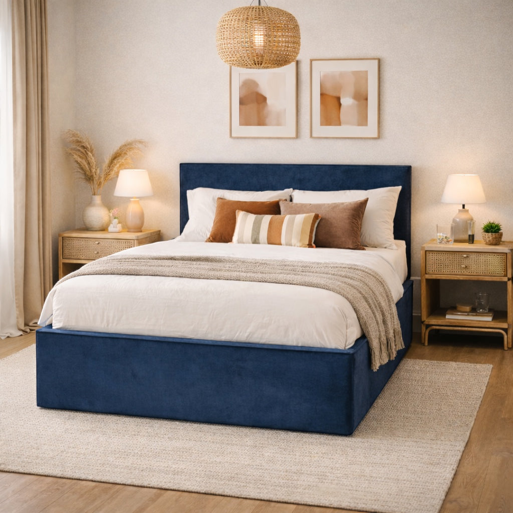 Vaya Home Soho upholstered bed in blue fabric, styled in a modern bedroom.