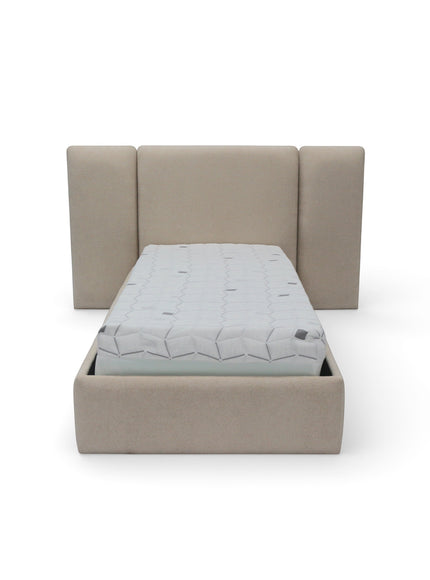 Front view of the Vaya Home Sutton kids bed with beige upholstery and a wingback-style headboard.