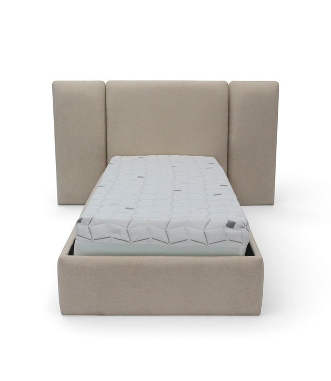 Front view of the Vaya Home Sutton kids bed with beige upholstery and a wingback-style headboard.