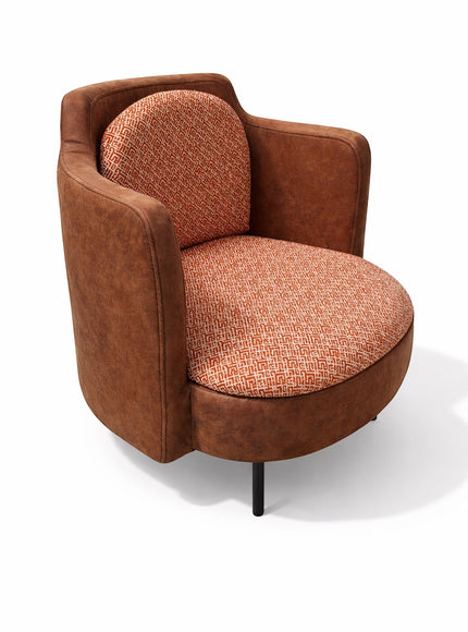 Vaya Home Terracotta armchair in brown eco-leather with orange geometric patterned upholstery on seat and back.