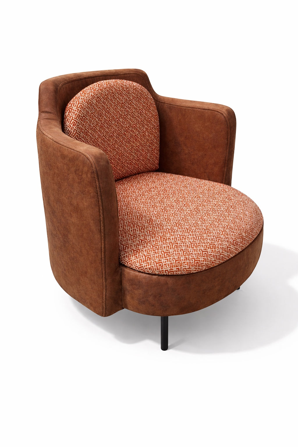 Vaya Home Terracotta armchair in brown eco-leather with orange geometric patterned upholstery on seat and back.