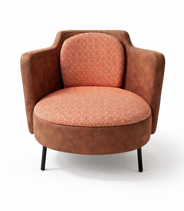 Vaya Home Terracotta armchair with rounded silhouette, brown eco-leather exterior, and orange geometric patterned upholstery.