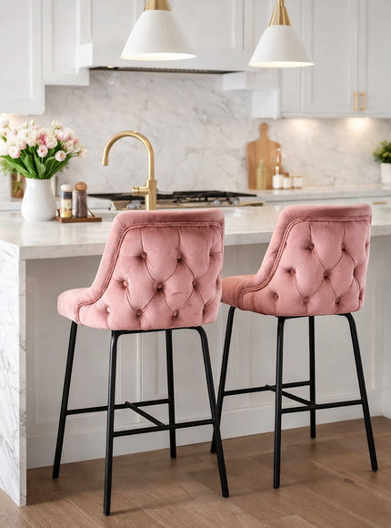 Vaya Home Toffel bar stool in pink velvet upholstery, styled at a modern kitchen island.