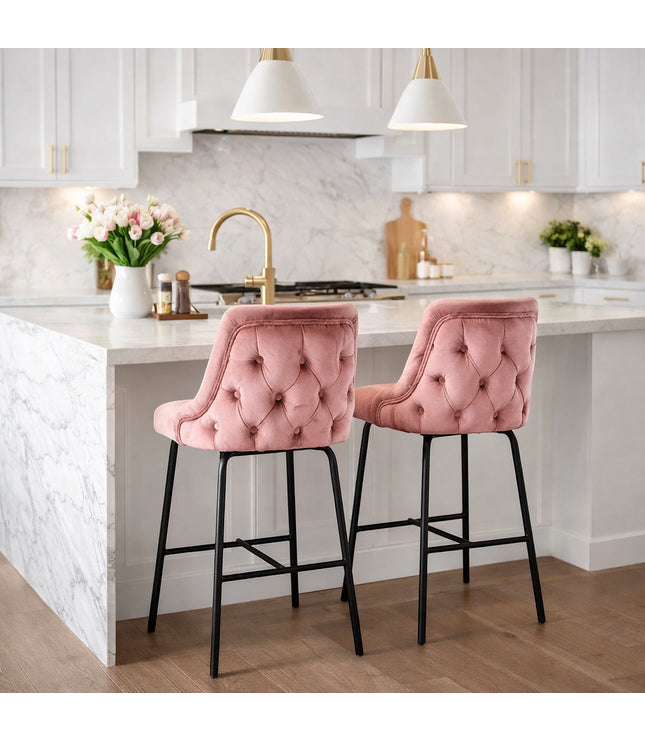 Vaya Home Toffel bar stool in pink velvet upholstery, styled at a modern kitchen island.