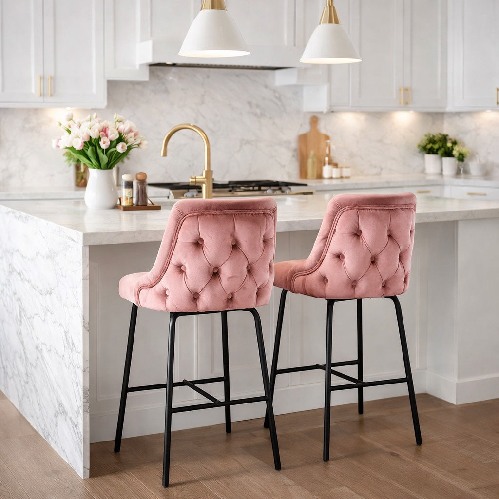 Vaya Home Toffel bar stool in pink velvet upholstery, styled at a modern kitchen island.