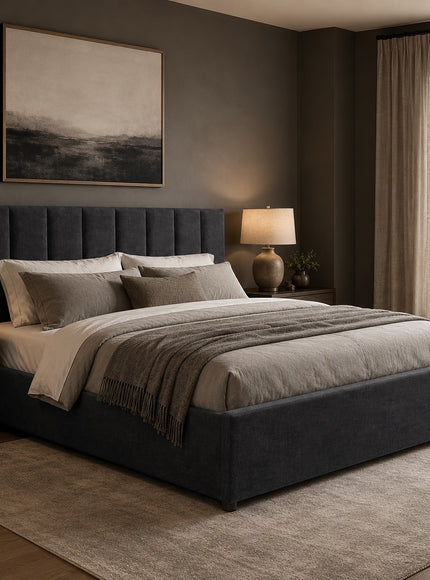 Vaya Home Torino upholstered platform bed in dark gray with a channel-tufted headboard, styled in a modern bedroom.