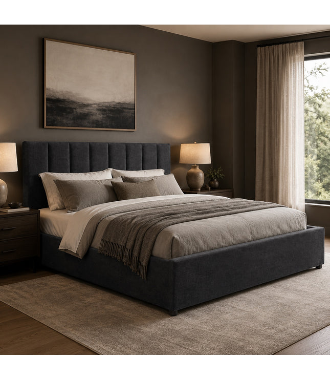 Vaya Home Torino upholstered platform bed in dark gray with a channel-tufted headboard, styled in a modern bedroom.