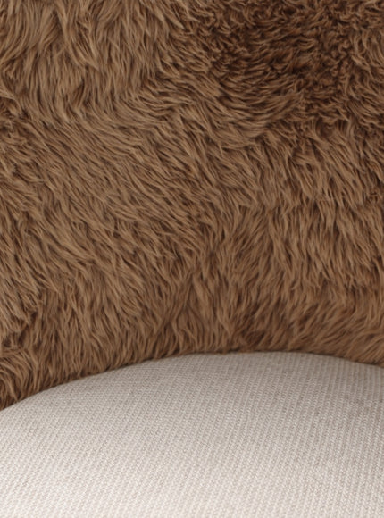 Close-up of the Vaya Home Valmont accent chair showing brown textured upholstery and cream woven seat fabric.