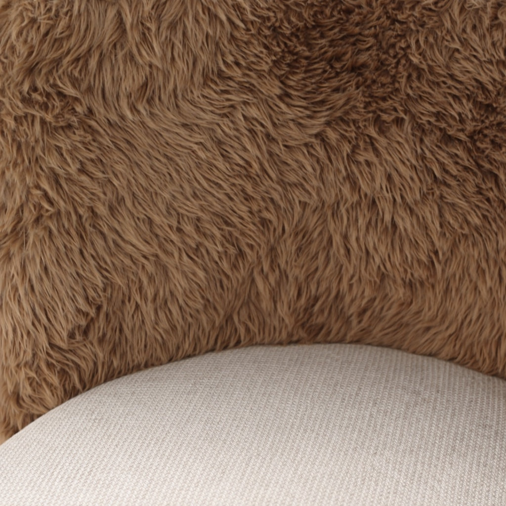 Close-up of the Vaya Home Valmont accent chair showing brown textured upholstery and cream woven seat fabric.