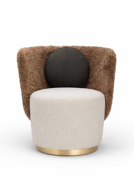 Front view of the Vaya Home Valmont accent chair with a cream upholstered seat, brown textured wraparound back, gold base trim, and black round cushion.