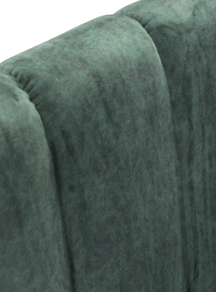 Close-up of the Vaya Home Vert loveseat showing deep green velvet upholstery and channel-tufted back detail.