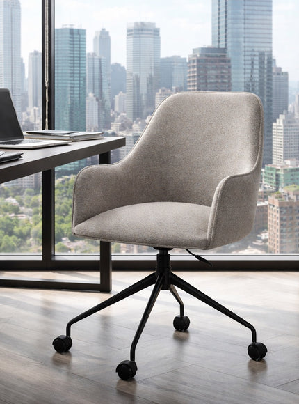 Vaya Home Wicky swivel office chair in gray upholstery, styled in a modern workspace with a black caster base.