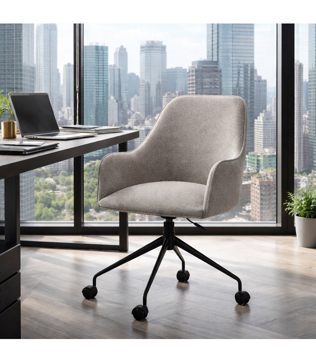 Vaya Home Wicky swivel office chair in gray upholstery, styled in a modern workspace with a black caster base.